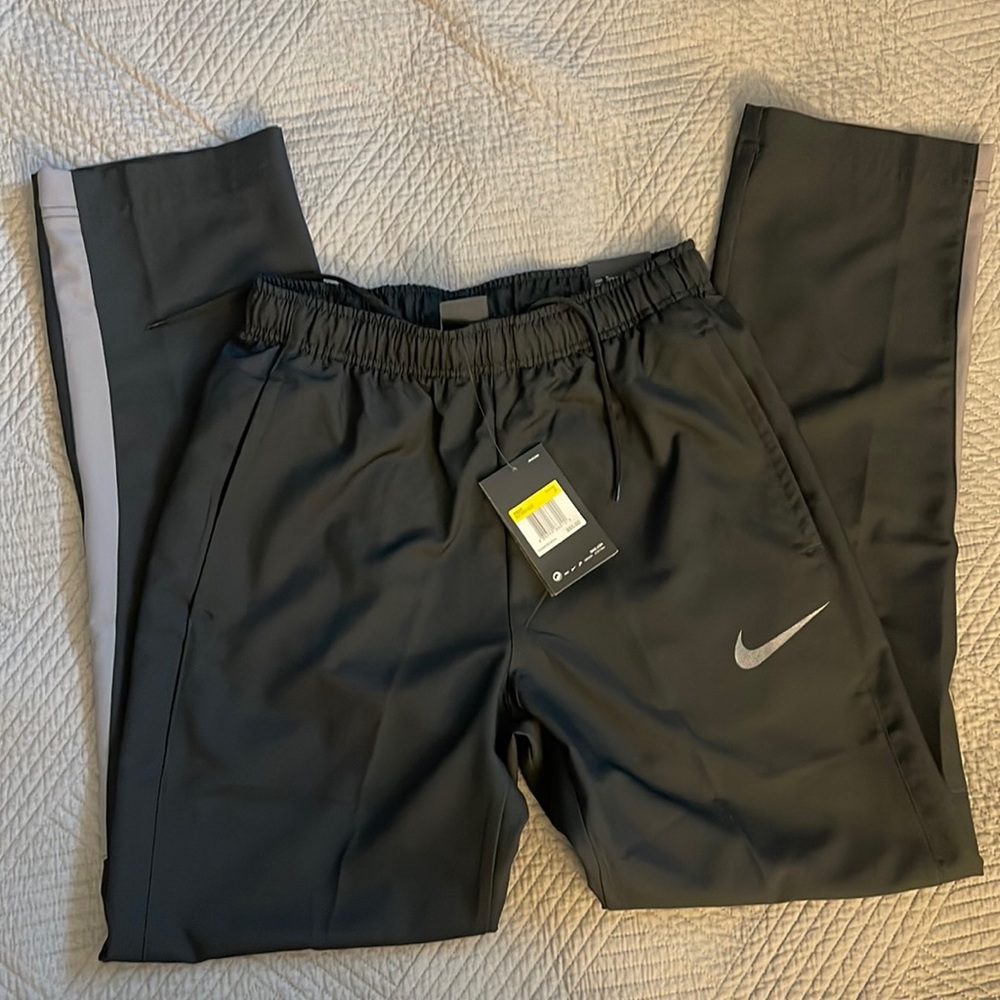 Men’s black with gray stripe track pants, size small